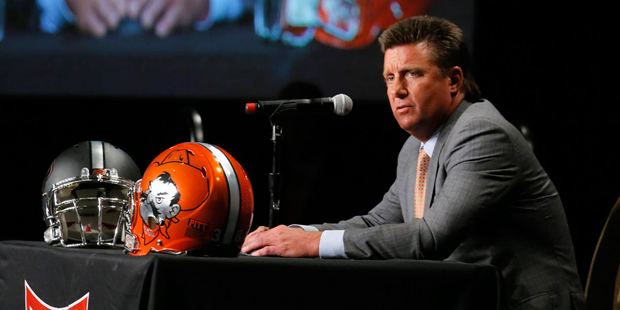 Oklahoma State head football coach Mike Gundy responds to questions during Big 12 media days, Monda...