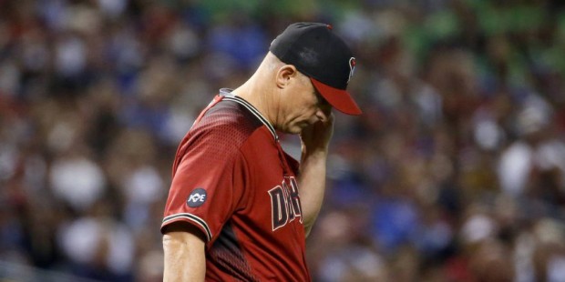 Arizona Diamondbacks manager Chip Hale walks to the mound during the seventh inning of a baseball g...