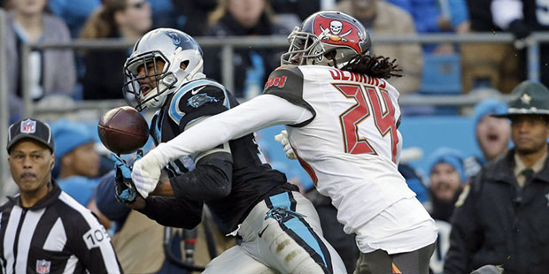 Carolina Panthers wide receiver Corey Brown, left, reaches for a pass as Tampa Bay Buccaneers corne...