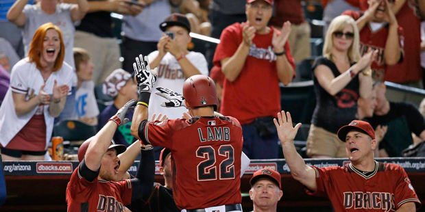 Arizona Diamondbacks' Jake Lamb (22) celebrates his two-run home run against the San Francisco Gian...