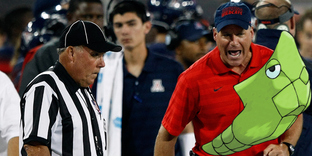 Rich Rodriguez directs Metapod after the Pokemon used harden instead of leaving the field, giving the Wildcats a penalty for too many players on the field.