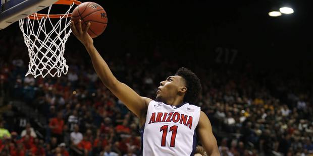 Arizona guard Allonzo Trier shoots against Colorado during the second half of an NCAA college baske...