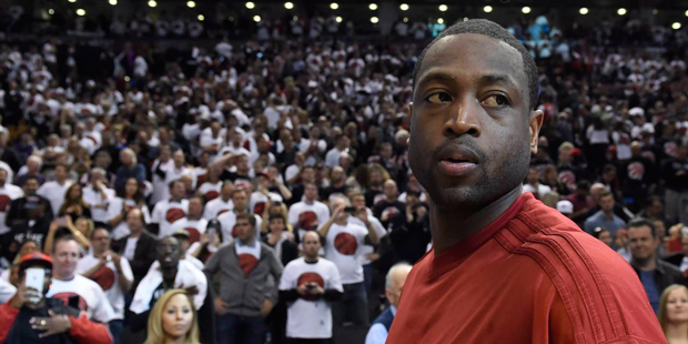Miami Heat's Dwyane Wade looks on after his team lost in Game 7 of the NBA basketball Eastern Confe...