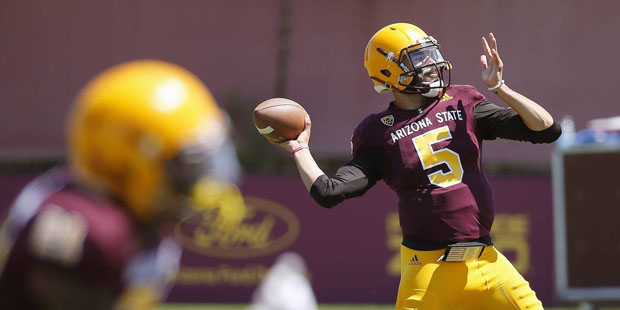 Arizona State quarterback Manny Wilkins throws a pass during a spring NCAA college football game Sa...