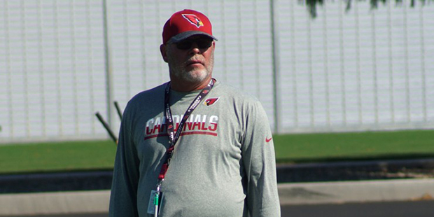 Coach Bruce Arians watches during a training camp practice Aug. 14. (Photo by Adam Green/Arizona Sp...