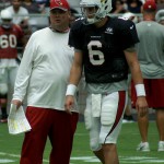 QB coach Freddie Kitchens chats with QB Jake Coker during training camp on Aug. 1. (Photo by Adam Green/Arizona Sports)