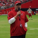 Cardinals coach Bruce Arians speaks to the crowd prior to the team's training camp practice Aug. 6. (Photo by Adam Green/Arizona Sports)