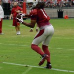 Receiver Larry Fitzgerald turns toward the end zone during training camp Aug. 5. (Photo by Adam Green/Arizona Sports)