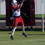 Receiver Amir Carlisle makes a catch during a training camp practice Aug. 14. (Photo by Adam Green/Arizona Sports)