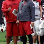 Offensive coordinator Harold Goodwin and coach Bruce Arians during training camp Aug. 24. (Photo by Adam Green/Arizona Sports)