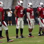The defensive line gets ready during training camp Aug. 22. (Photo by Adam Green/Arizona Sports)