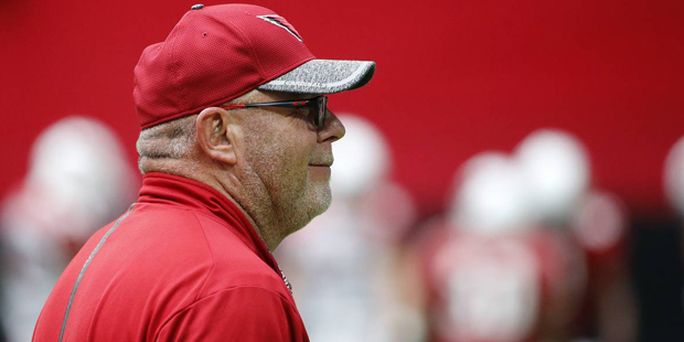 Arizona Cardinals head coach Bruce Arians smiles as he watches his players during practice at the N...