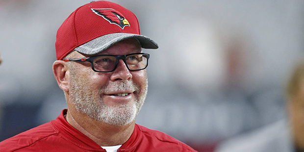 FILE - In this Aug. 12, 2016 file photo, Arizona Cardinals head coach Bruce Arians smiles as he pac...