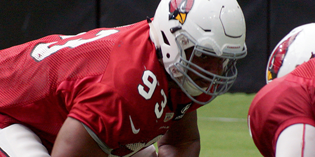 Calais Campbell lines up for a drill during training camp Aug. 22. (Photo by Adam Green/Arizona Spo...