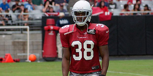 Andre Ellington waits during a training camp practice Aug. 5. (Photo by Adam Green/Arizona Sports)...
