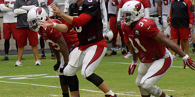 David Johnson begins his route as the ball is snapped during a training camp practice. (Photo by Ad...