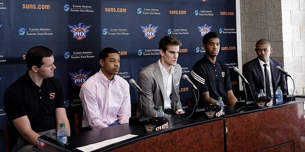 From left to right, Phoenix Suns general manager Ryan McDonough, second-round draft pick Tyler Ulis...