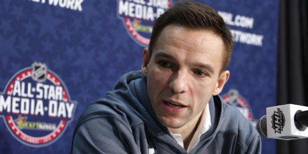 Vancouver Canucks' Radim Vrbata, of the Czech Republic, is interviewed during Media Day at the NHL ...