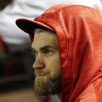 Washington Nationals' Bryce Harper sits in the dugout during the first inning of the team's baseball game against the Arizona Diamondbacks, Tuesday, Aug. 2, 2016, in Phoenix. Harper was scheduled to play but was scratched before the game. (AP Photo/Rick Scuteri)