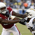 Arizona Cardinals' Brandon Williams, left, and San Diego Chargers' Darrell Stuckey battle during the first half of a preseason NFL football game, Friday, Aug. 19, 2016, in San Diego. (AP Photo/Denis Poroy)