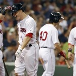 
              Boston Red Sox's Brock Holt, second from left, celebrates his two-run home run that also drove in Sandy Leon, right, during the sixth inning of a baseball game against the Arizona Diamondbacks in Boston, Saturday, Aug. 13, 2016. (AP Photo/Michael Dwyer)
            