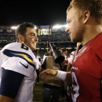 San Diego Chargers quarterback Mike Bercovici, left, and Arizona Cardinals quarterback Matt Barkley greet each other after the Chargers defeated the Cardinals 19-3 in a preseason NFL football game, Friday, Aug. 19, 2016, in San Diego. (AP Photo/Rick Scuteri)
