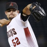 Arizona Diamondbacks' Zack Godley throws a pitch against the Atlanta Braves during the first inning of a baseball game, Monday, Aug. 22, 2016, in Phoenix. (AP Photo/Ross D. Franklin)