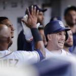San Diego Padres' Patrick Kivlehan, right, is congratulated by teammates after hitting a home run during the fifth inning of a baseball game against the Arizona Diamondbacks, Saturday, Aug. 20, 2016, in San Diego. The home run by Patrick Kivlehan was his first Major League hit. (AP Photo/Don Boomer)