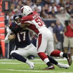 Houston Texans quarterback Brock Osweiler (17) is sacked by Arizona Cardinals middle linebacker Kevin Minter (51) during the first half of an NFL preseason football game, Sunday, Aug. 28, 2016, in Houston. (AP Photo/Jeff Roberson)
