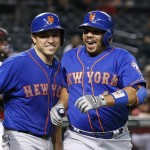 New York Mets' Rene Rivera, right, celebrates his two-run home run against the Arizona Diamondbacks with Travis d'Arnaud during the ninth inning of a baseball game Wednesday, Aug. 17, 2016, in Phoenix. The Diamondbacks defeated the Mets 13-5. (AP Photo/Ross D. Franklin)