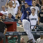 
              Milwaukee Brewers' Jonathan Villar makes a leaping catch on a foul ball hit by Arizona Diamondbacks' Tuffy Gosewisch during the fourth inning of a baseball game Sunday, Aug. 7, 2016, in Phoenix. (AP Photo/Ross D. Franklin)
            