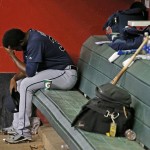 Atlanta Braves pitcher Arodys Vizcaino sits alone in the dugout after giving up four runs to the Arizona Diamondbacks during the seventh inning of a baseball game Monday, Aug. 22, 2016, in Phoenix. (AP Photo/Ross D. Franklin)