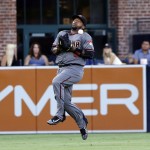 
              Arizona Diamondbacks left fielder Ricky Weeks Jr. bobbles this pop fly by San Diego Padres' Ryan Schimpf during the fourth inning in a baseball game, Saturday, Aug. 20, 2016, in San Diego. Schimpf was safe on the fielding error. (AP Photo/Don Boomer)
            