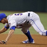 New York Mets' T.J. Rivera drops a grounder hit by Arizona Diamondbacks' Jean Segura for an error during the first inning of a baseball game, Monday, Aug. 15, 2016, in Phoenix. (AP Photo/Ross D. Franklin)