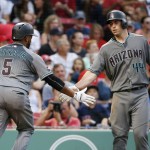 Arizona Diamondbacks' Rickie Weeks (5) celebrates his two-run home run that also drove in Paul Goldschmidt, right, during the first inning of a baseball game against the Boston Red Sox in Boston, Friday, Aug. 12, 2016. (AP Photo/Michael Dwyer)