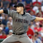 
              Arizona Diamondbacks' Patrick Corbin pitches during the first inning of a baseball game against the Boston Red Sox in Boston, Friday, Aug. 12, 2016. (AP Photo/Michael Dwyer)
            