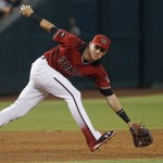 Arizona Diamondbacks' Jake Lamb is unable to run down a grounder hit by Washington Nationals' Pedro Severino during the fifth inning of a baseball game Wednesday, Aug. 3, 2016, in Phoenix. (AP Photo/Ross D. Franklin)