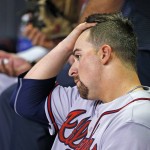 Atlanta Braves pitcher Rob Whalen sits on the bench after being taken out during the third inning of a baseball game against the Arizona Diamondbacks on Tuesday, Aug. 23, 2016, in Phoenix. (AP Photo/Ross D. Franklin)