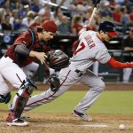 Washington Nationals' Trea Turner (7) runs to first base after Arizona Diamondbacks' Tuffy Gosewisch, left, dropped the third strike during the sixth inning of a baseball game Wednesday, Aug. 3, 2016, in Phoenix. The Diamondbacks' Gosewisch was able to throw to first base for the out on the play. (AP Photo/Ross D. Franklin)