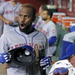New York Mets' Jose Reyes shouts from the dugout after a teammate scored against the Arizona Diamondbacks during the sixth inning of a baseball game Tuesday, Aug. 16, 2016, in Phoenix. The Mets won 7-5. (AP Photo/Ross D. Franklin)