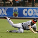 Washington Nationals' Bryce Harper dives but is unable to make a catch on a run-scoring single hit by Arizona Diamondbacks' Brandon Drury during the fifth inning of a baseball game Wednesday, Aug. 3, 2016, in Phoenix. (AP Photo/Ross D. Franklin)