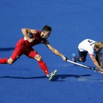 Belgium's Cedric Charlier, left, fights for the ball with Great Britain's Ashley Jackson during a men's field hockey match at the 2016 Summer Olympics in Rio de Janeiro, Brazil, Saturday, Aug. 6, 2016. (AP Photo/Dario Lopez-Mills)