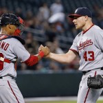 Washington Nationals' Mark Melancon (43) shakes hands with catcher Pedro Severino, left, after the final out against the Arizona Diamondbacks during the ninth inning of a baseball game Wednesday, Aug. 3, 2016, in Phoenix. The Nationals defeated the Diamondbacks 8-3. (AP Photo/Ross D. Franklin)