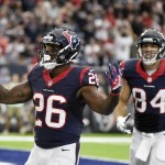 Houston Texans running back Lamar Miller (26) celebrates a touchdown during the first half of an NFL preseason football game against the Arizona Cardinals, Sunday, Aug. 28, 2016, in Houston. (AP Photo/Eric Christian Smith)