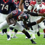 Houston Texans wide receiver Braxton Miller (13) is grabbed by Arizona Cardinals defensive back Mike Jenkins (43) during the first half of an NFL preseason football game, Sunday, Aug. 28, 2016, in Houston. (AP Photo/George Bridges)