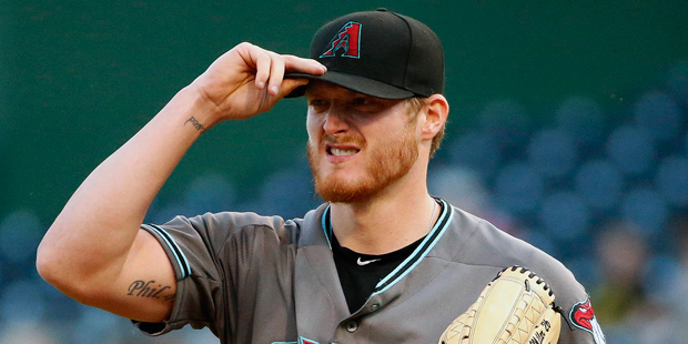 Arizona Diamondbacks starting pitcher Shelby Miller collects himself on the mound after giving up a...