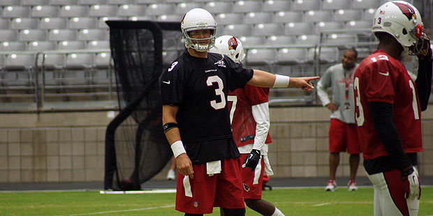 Arizona Cardinals quarterback Carson Palmer directing the offense during training camp on Aug. 10, ...