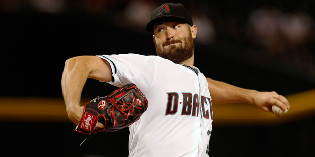 Arizona Diamondbacks pitcher Robbie Ray throws during the first inning of a baseball game against t...