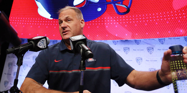 Arizona head coach Rich Rodriguez speaks to reporters at the Pac-12 NCAA college football media day...