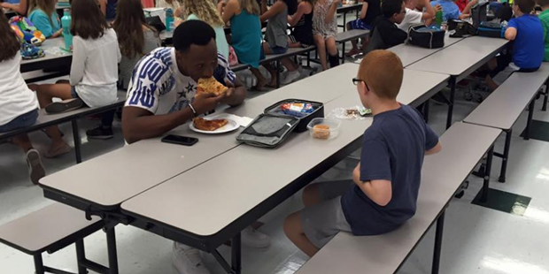 Travis Rudolph has lunch with a boy and brightens the child's mother's day....